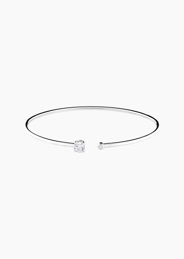 
                                                                                    Beguin flexible bangle bracelet in gold and diamonds / Lepage
                                                                            