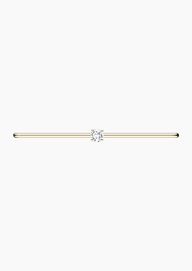 Pur flexible bangle bracelet in gold and diamonds / Lepage