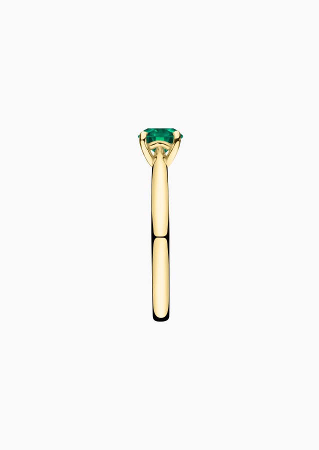 Foudre solitaire in gold and emerald / Lepage