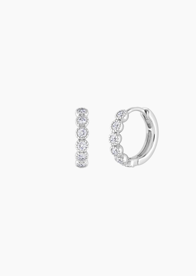 
                                                                                    Capucine hoop earrings in gold and diamonds / Lepage
                                                                            