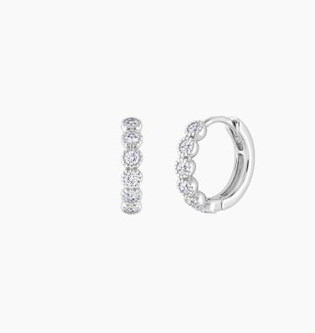 
                                                                                    Capucine hoop earrings in gold and diamonds / Lepage
                                                                            