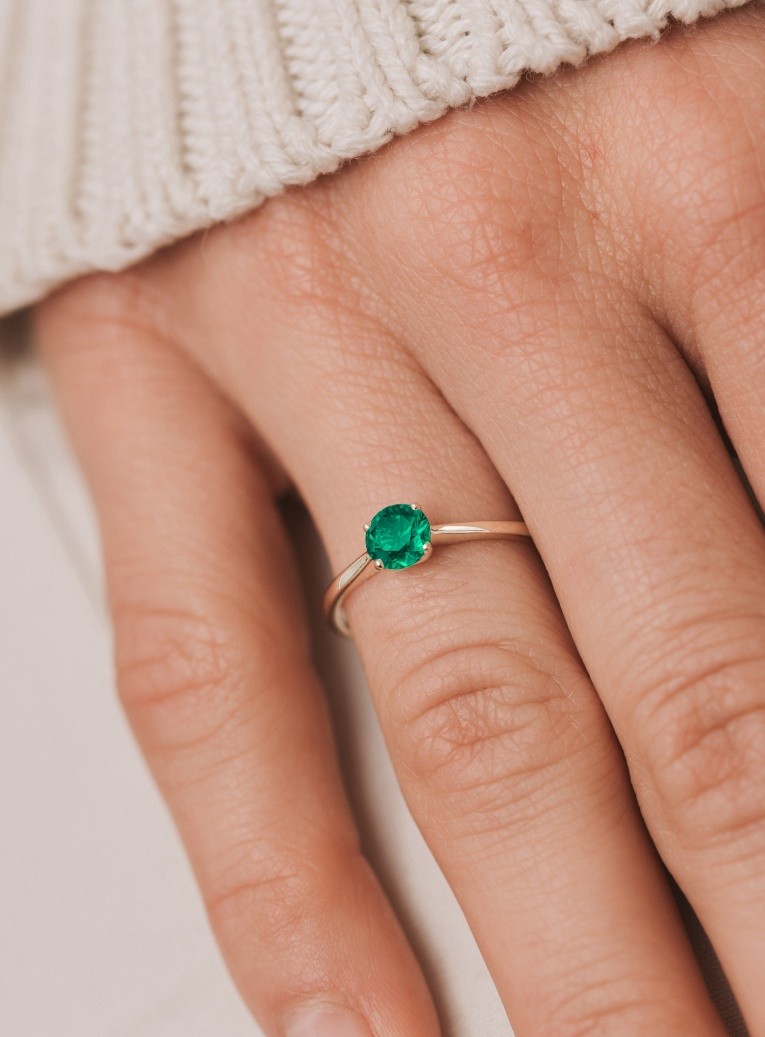 Pink gold and emerald ring