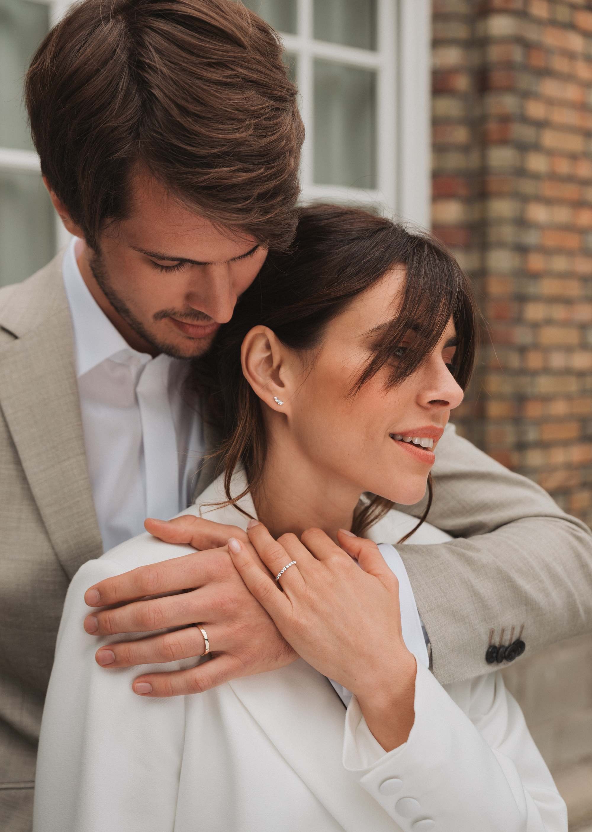 Couple posing to present lepage jewellery