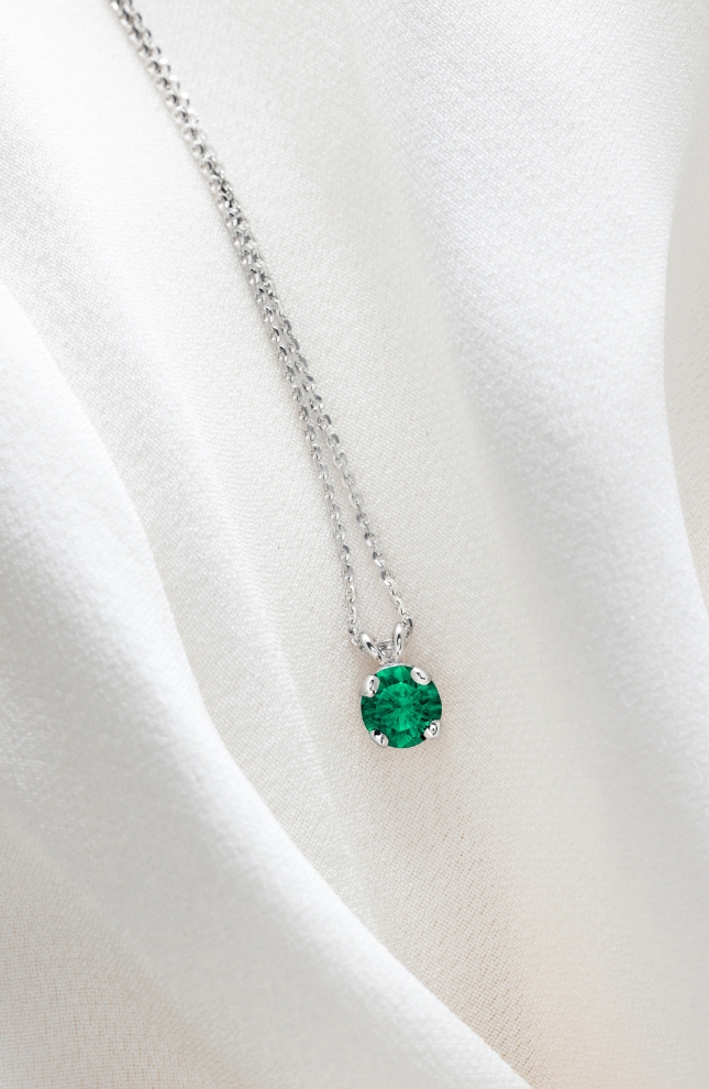 white gold and emerald necklace
