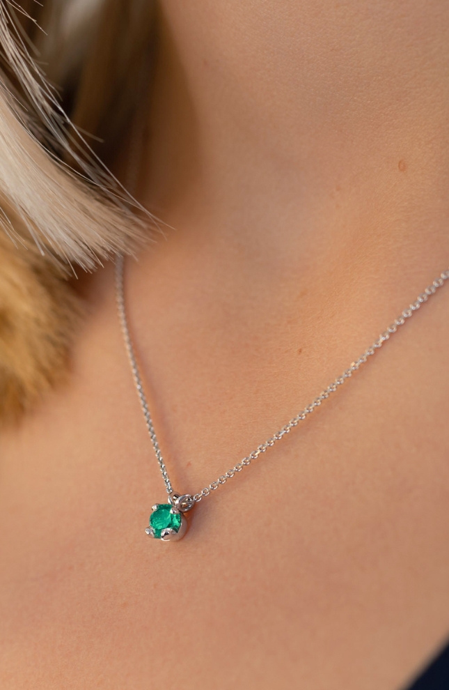 white gold and emerald necklace